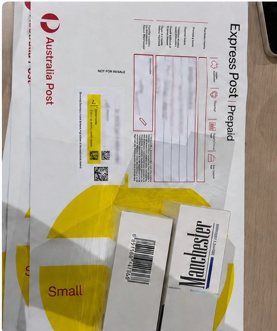 Packed customer parcel ready for tracked Australia Post dispatch